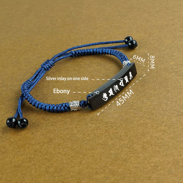 Bracelet de protection incrusté d'argent en bois d'ébène et de Buddha Stones