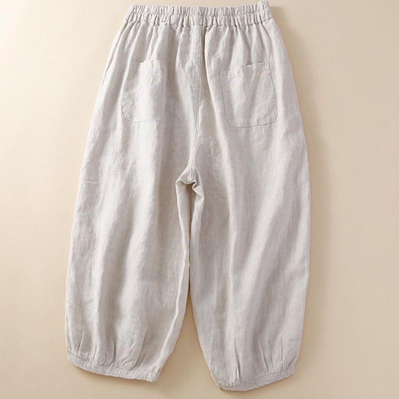 Pantalon harem ample à cordon de serrage et poches, couleur unie, motif floral et Buddha Stones - image 1