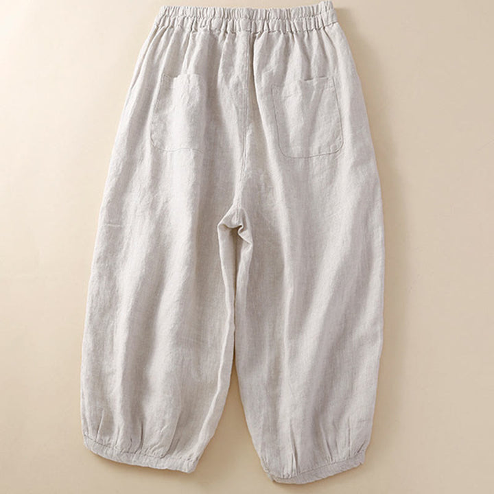 Pantalon harem ample à cordon de serrage et poches, couleur unie, motif floral et Buddha Stones - image 1