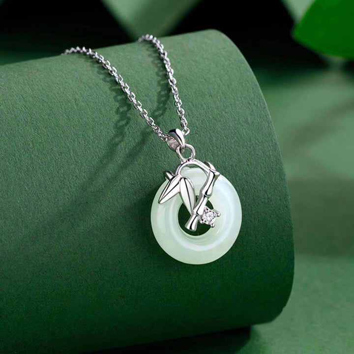 Buddha Stones Collier pendentif en argent sterling 925 avec boucle de paix et feuille de bambou en jade Hetian