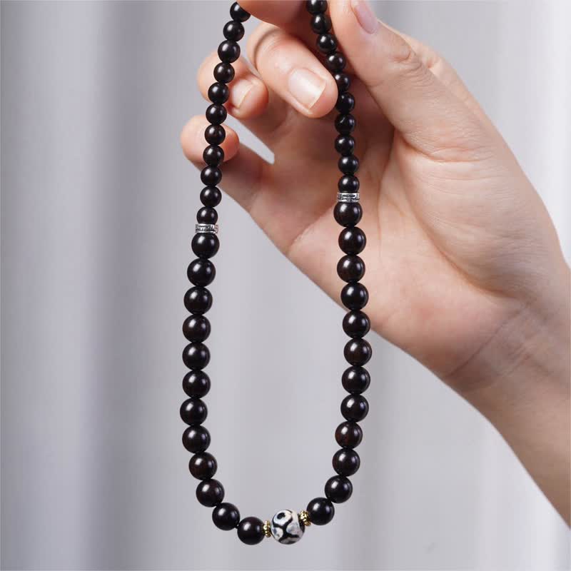 Bracelet double tour en perles dzi en bois d'ébène tibétain et Buddha Stones