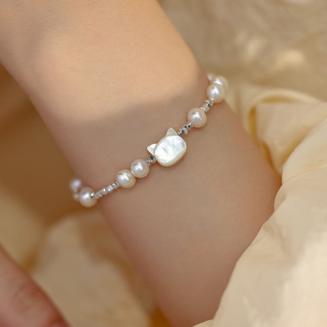 Bracelet de guérison en argent avec chaîne en pierre Tridacna et tête de chat en Buddha Stones - Perle (tour de poignet 14-16 cm) - image 1