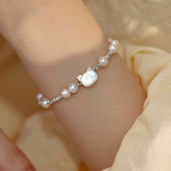 Bracelet de guérison en argent avec chaîne en pierre Tridacna et tête de chat en Buddha Stones - Perle (tour de poignet 14-16 cm) - image 1