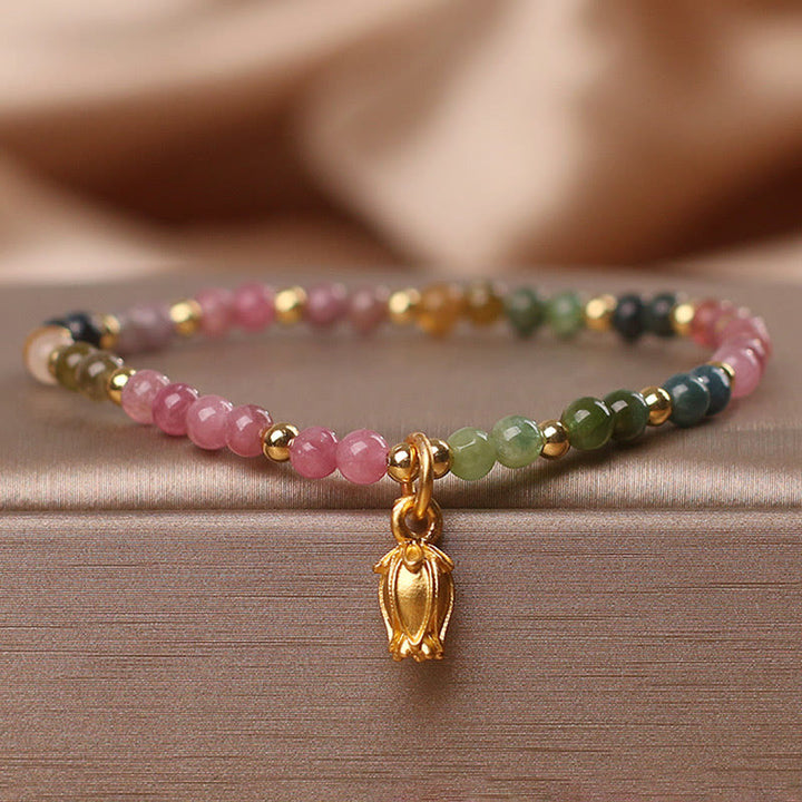 Bracelet positif en Buddha Stones et fleurs de tourmaline colorées