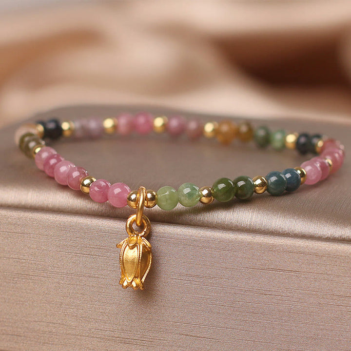 Bracelet positif en Buddha Stones et fleurs de tourmaline colorées