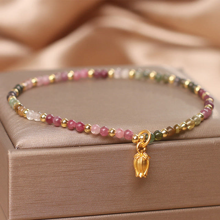 Bracelet positif en Buddha Stones et fleurs de tourmaline colorées