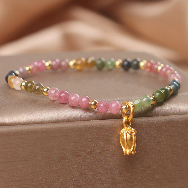 Bracelet positif en Buddha Stones et fleurs de tourmaline colorées