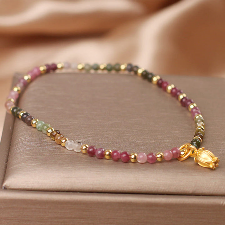 Bracelet positif en Buddha Stones et fleurs de tourmaline colorées
