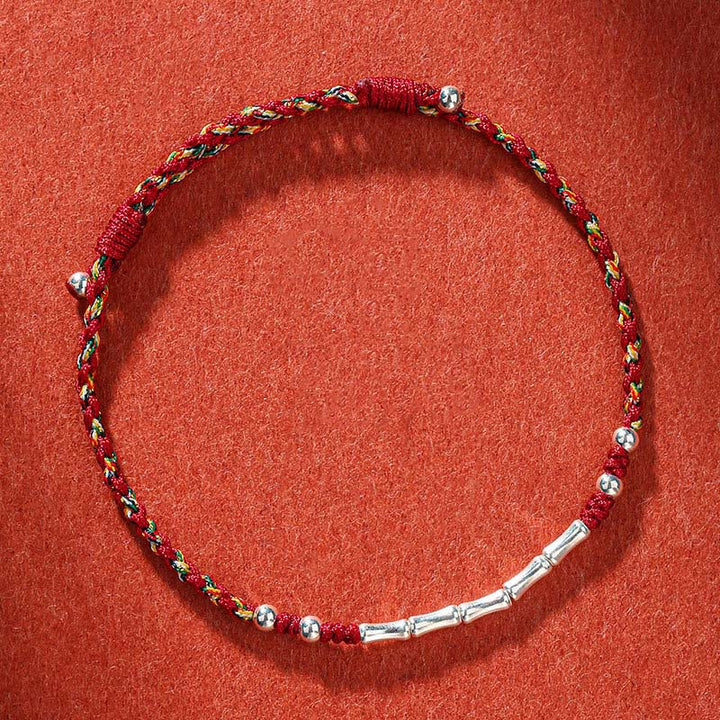 Bracelet tressé en bambou multicolore fait main avec Buddha Stones tibétaines