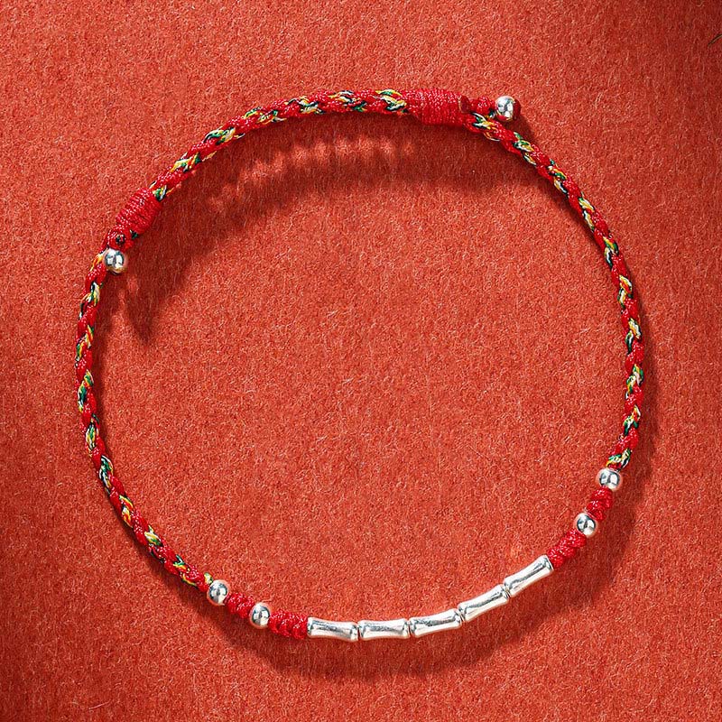 Bracelet tressé en bambou multicolore fait main avec Buddha Stones tibétaines