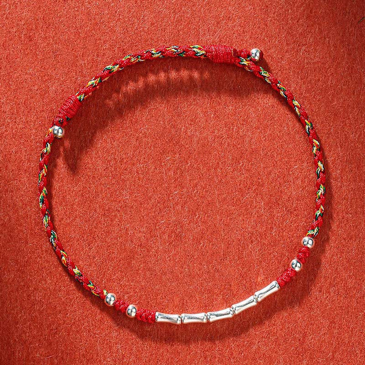 Bracelet tressé en bambou multicolore fait main avec Buddha Stones tibétaines