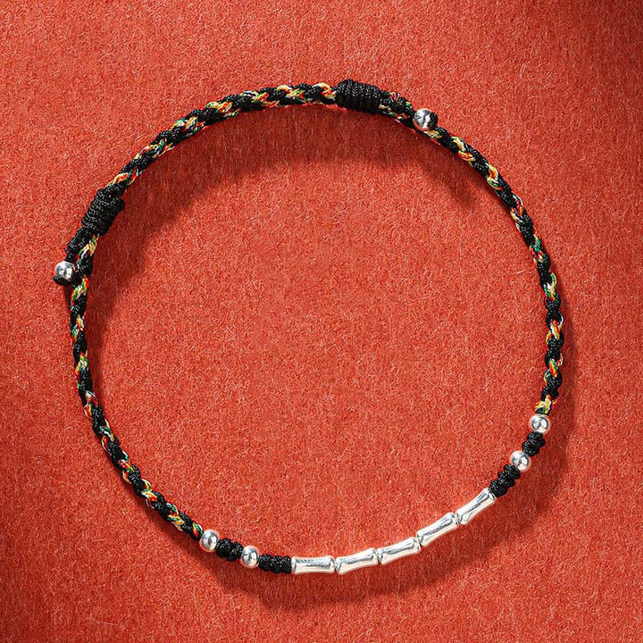 Bracelet tressé en bambou multicolore fait main avec Buddha Stones tibétaines
