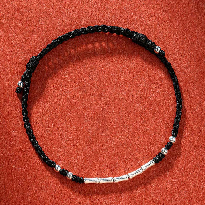 Bracelet tressé en bambou multicolore fait main avec Buddha Stones tibétaines