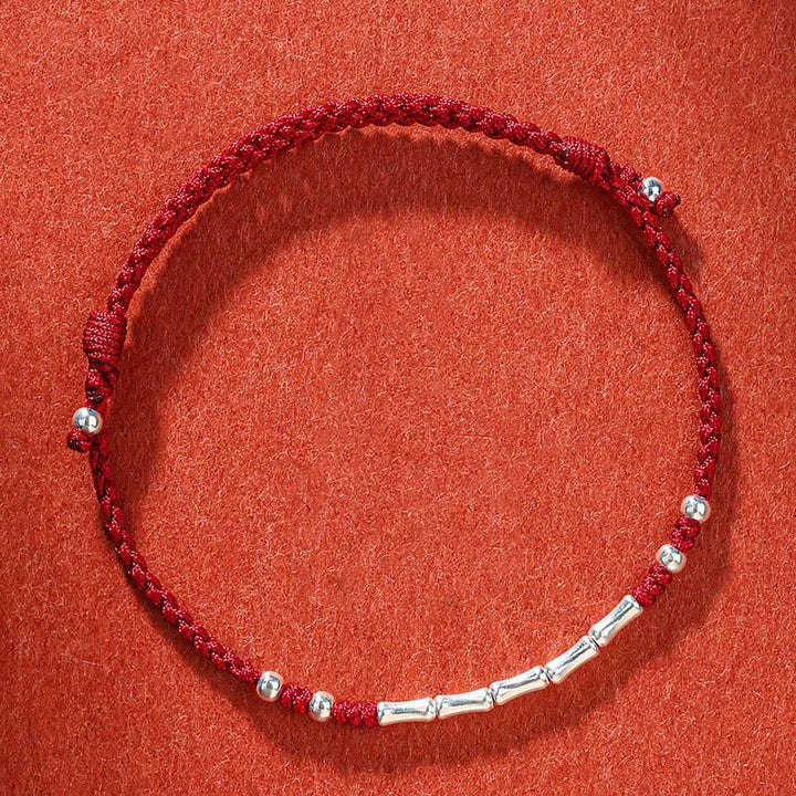 Bracelet tressé en bambou multicolore fait main avec Buddha Stones tibétaines