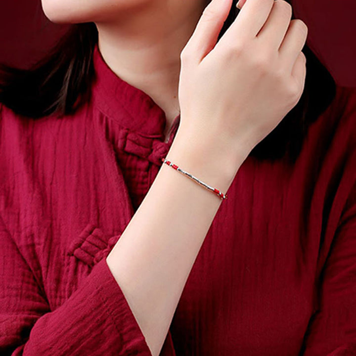 Bracelet tressé en bambou multicolore fait main avec Buddha Stones tibétaines
