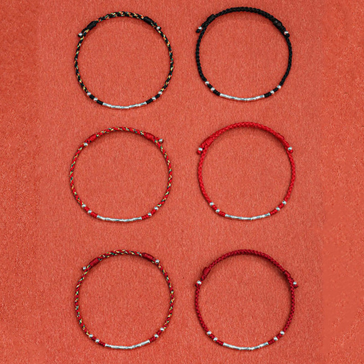 Bracelet tressé en bambou multicolore fait main avec Buddha Stones tibétaines
