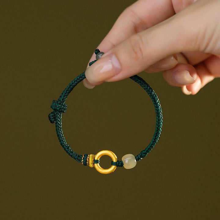 Bracelet tressé en corde verte avec perles de jade Hetian en argent sterling 999 et Buddha Stones