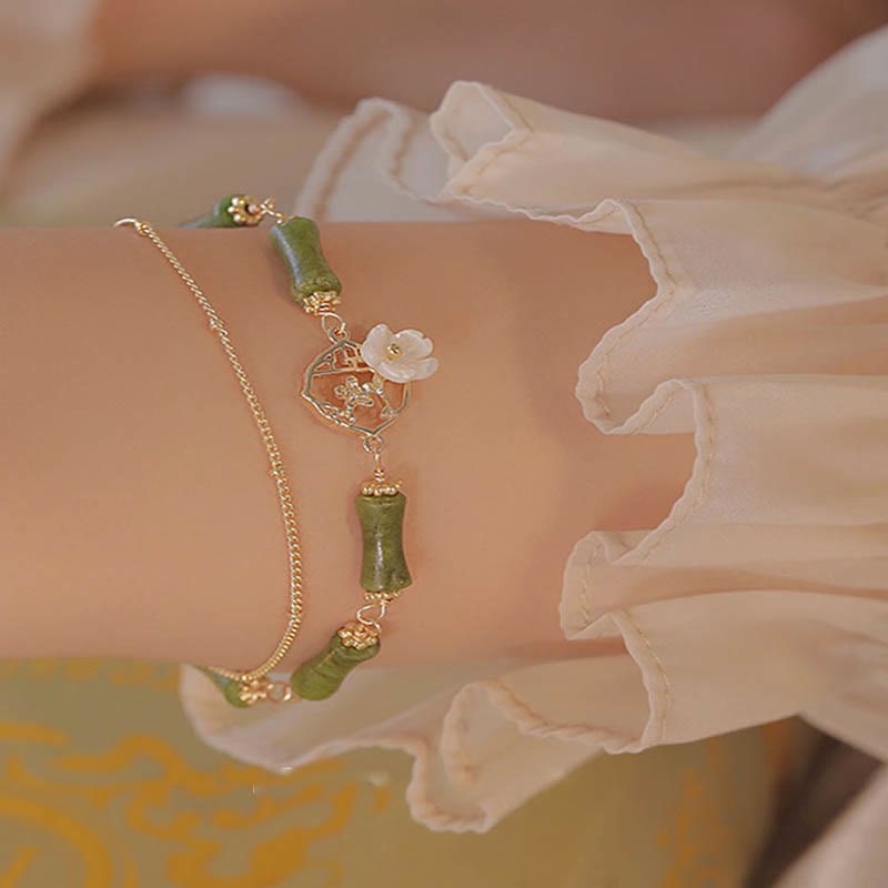 Bracelet double couche en cuivre plaqué or 14 carats avec péridot et fleur de bambou de Buddha Stones