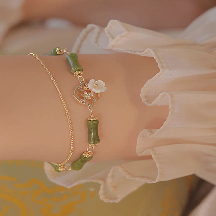 Bracelet double couche en cuivre plaqué or 14 carats avec péridot et fleur de bambou de Buddha Stones