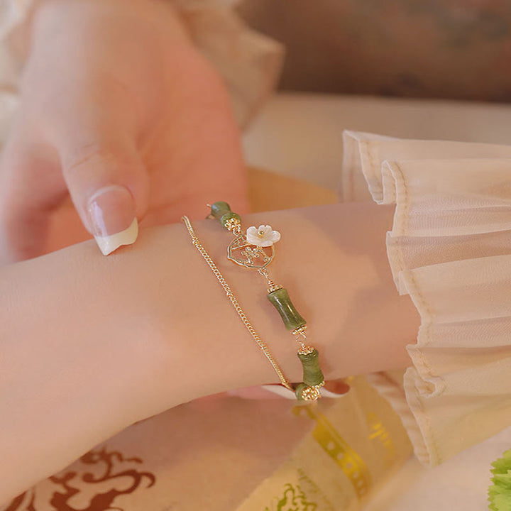 Bracelet double couche en cuivre plaqué or 14 carats avec péridot et fleur de bambou de Buddha Stones