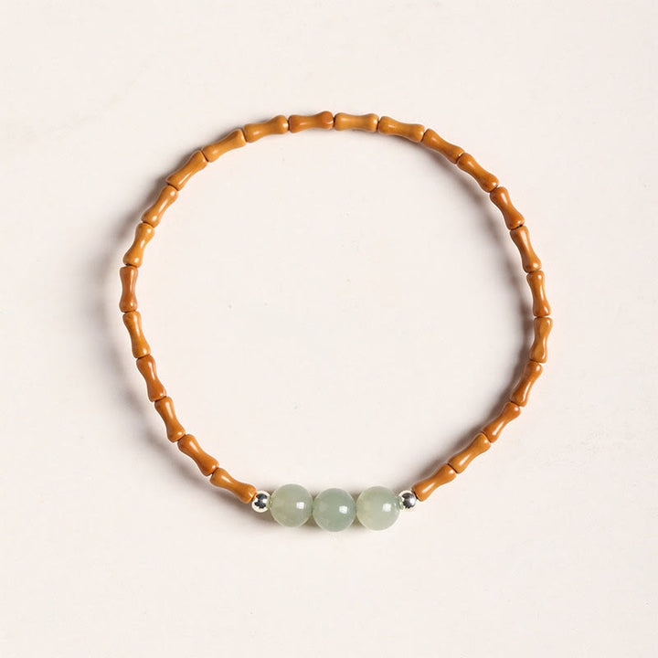 Bracelet porte-bonheur en perles de jade Hetian à motif de bambou et noyau d'olive naturelle de Buddha Stones