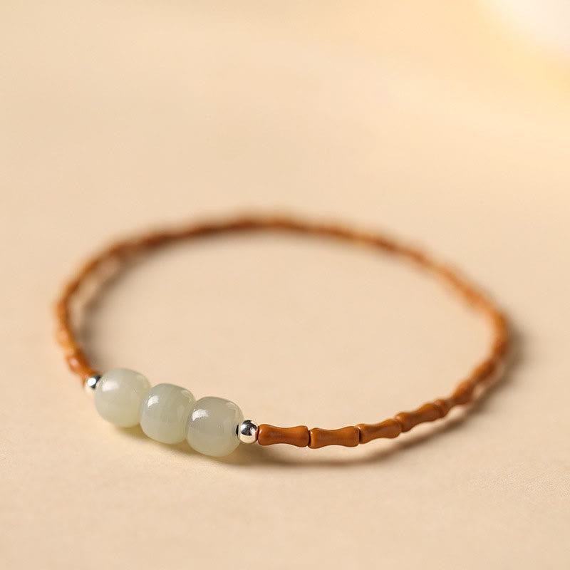Bracelet porte-bonheur en perles de jade Hetian à motif de bambou et noyau d'olive naturelle de Buddha Stones