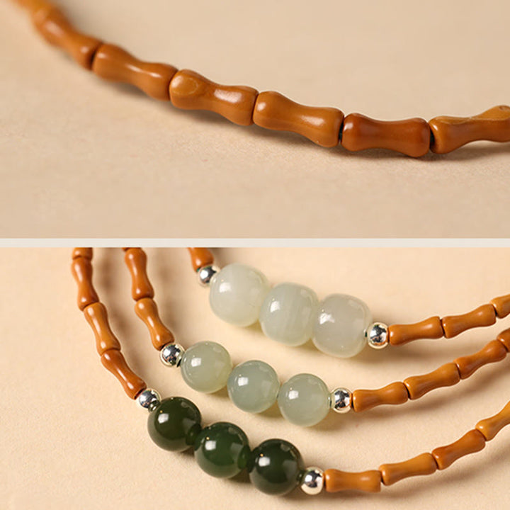 Bracelet porte-bonheur en perles de jade Hetian à motif de bambou et noyau d'olive naturelle de Buddha Stones