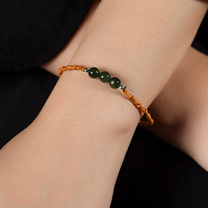 Bracelet porte-bonheur en perles de jade Hetian à motif de bambou et noyau d'olive naturelle de Buddha Stones