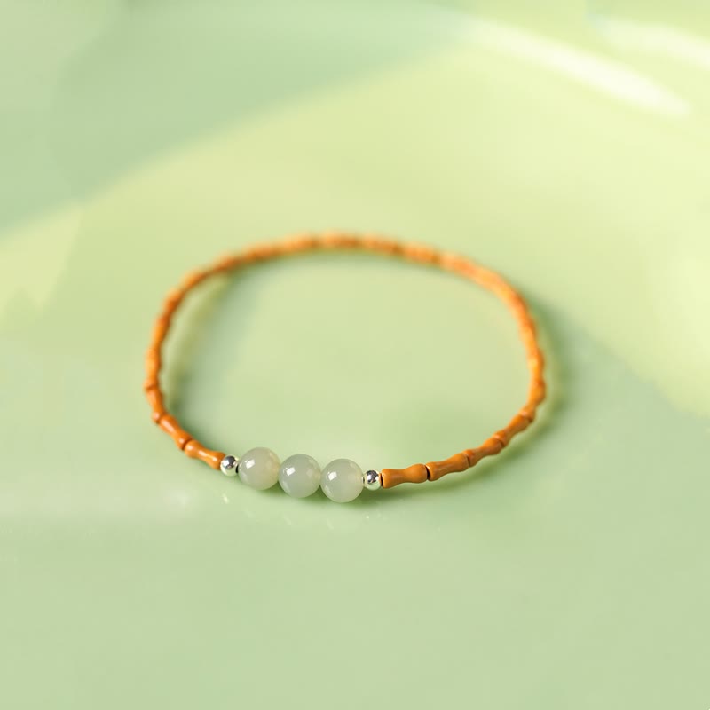 Bracelet porte-bonheur en perles de jade Hetian à motif de bambou et noyau d'olive naturelle de Buddha Stones