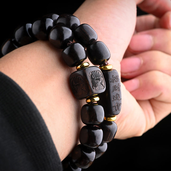 Bracelet d'équilibre porte-bonheur et trésor en perles de bois d'ébène tibétain avec Buddha Stones