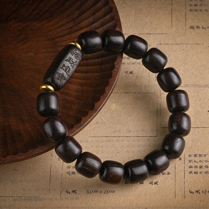 Bracelet d'équilibre porte-bonheur et trésor en perles de bois d'ébène tibétain avec Buddha Stones