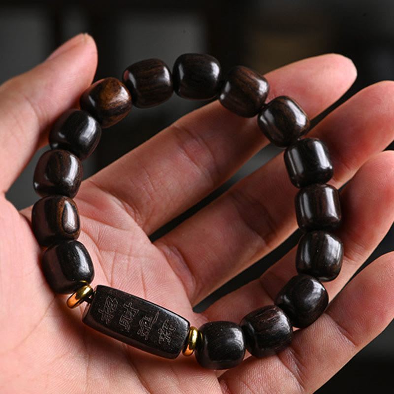 Bracelet d'équilibre porte-bonheur et trésor en perles de bois d'ébène tibétain avec Buddha Stones