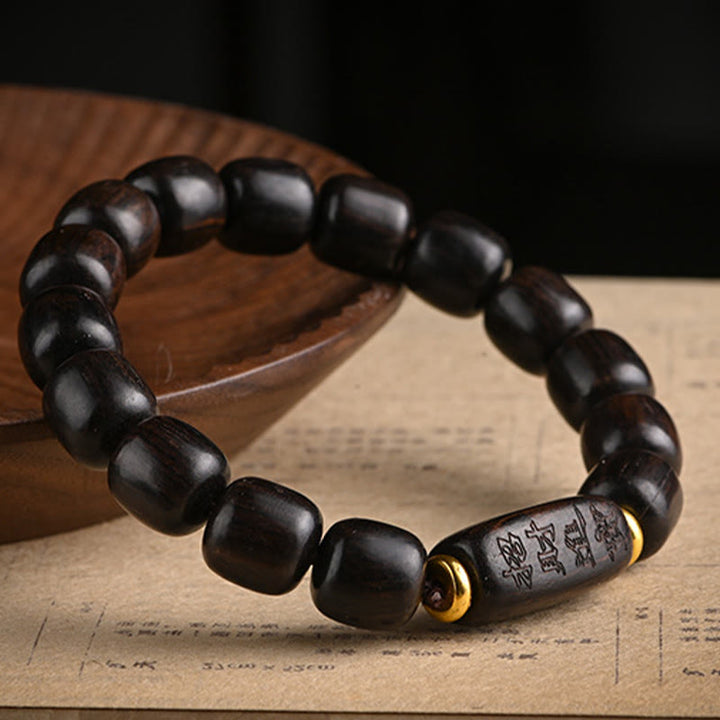 Bracelet d'équilibre porte-bonheur et trésor en perles de bois d'ébène tibétain avec Buddha Stones