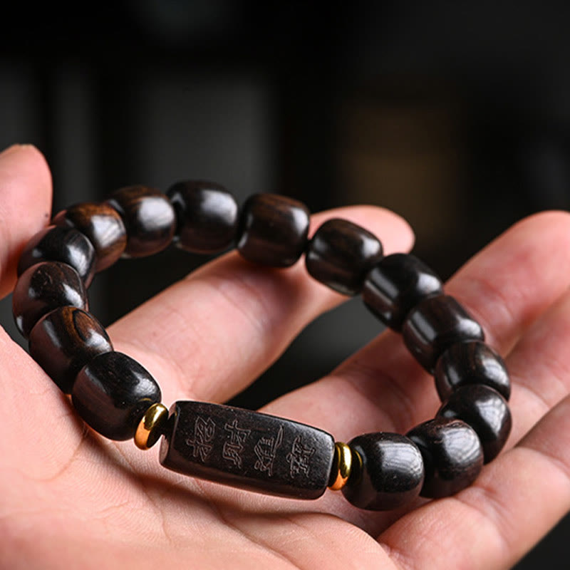 Bracelet d'équilibre porte-bonheur et trésor en perles de bois d'ébène tibétain avec Buddha Stones