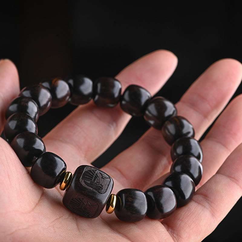 Bracelet d'équilibre porte-bonheur et trésor en perles de bois d'ébène tibétain avec Buddha Stones
