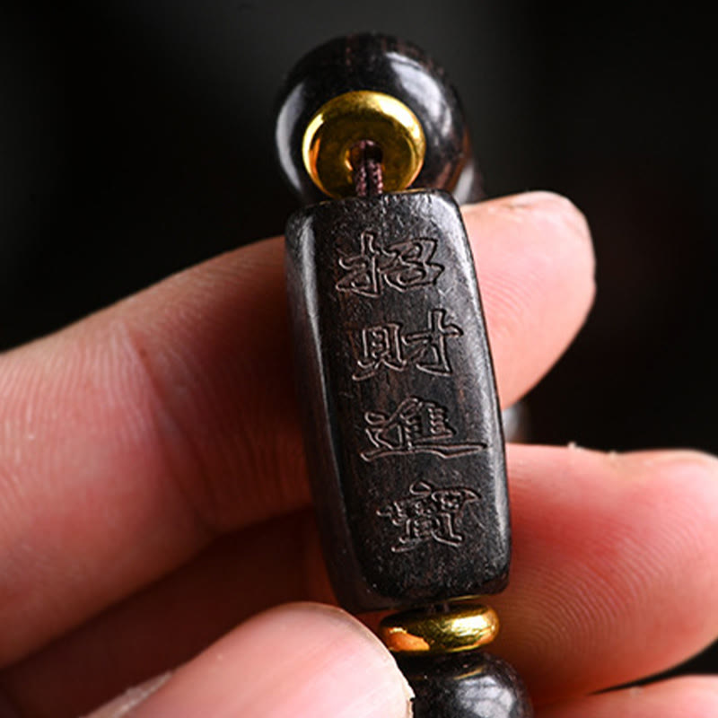 Bracelet d'équilibre porte-bonheur et trésor en perles de bois d'ébène tibétain avec Buddha Stones