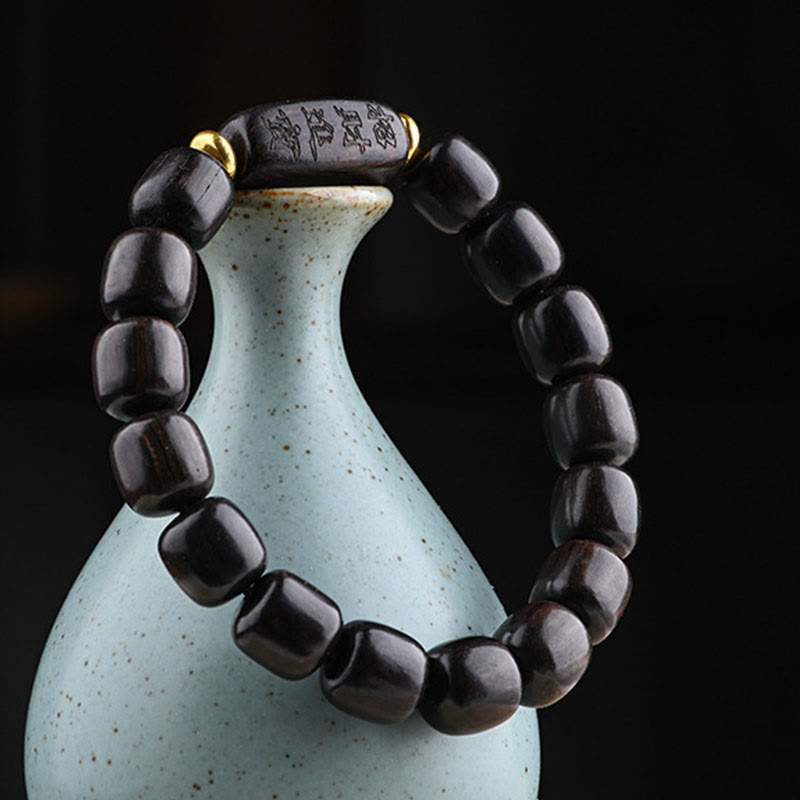 Bracelet d'équilibre porte-bonheur et trésor en perles de bois d'ébène tibétain avec Buddha Stones