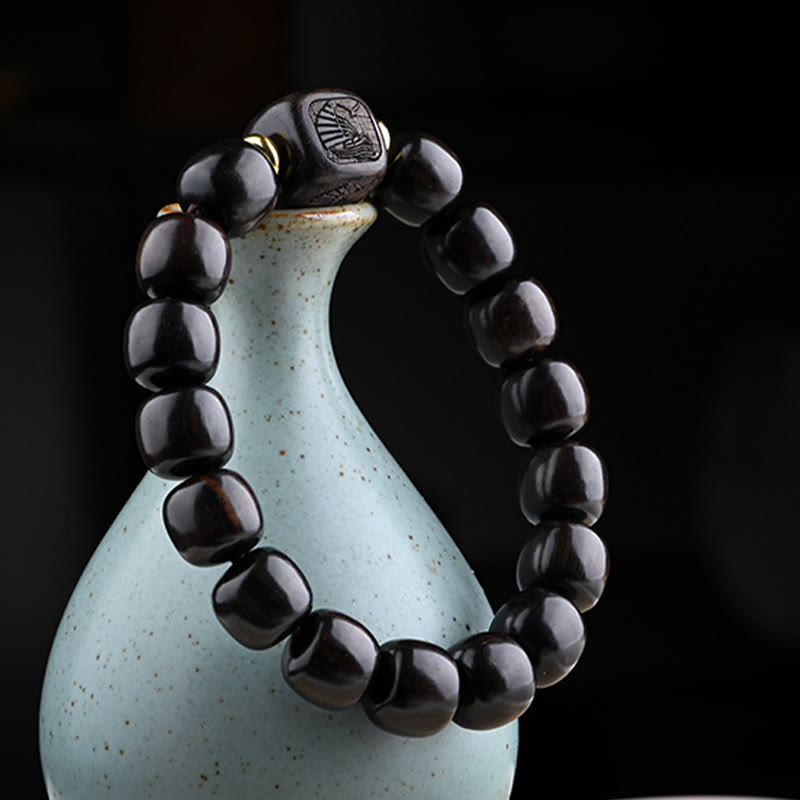 Bracelet d'équilibre porte-bonheur et trésor en perles de bois d'ébène tibétain avec Buddha Stones