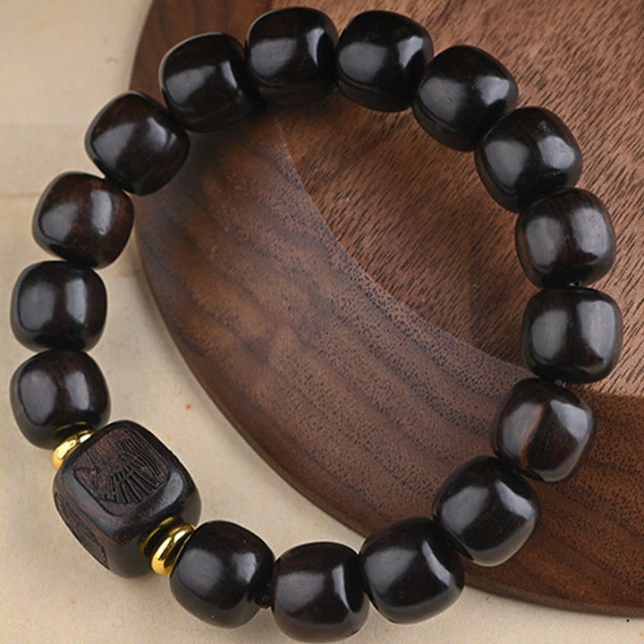 Bracelet d'équilibre porte-bonheur et trésor en perles de bois d'ébène tibétain avec Buddha Stones