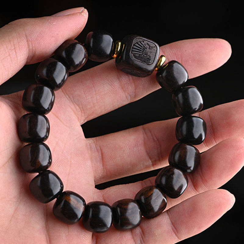 Bracelet d'équilibre porte-bonheur et trésor en perles de bois d'ébène tibétain avec Buddha Stones