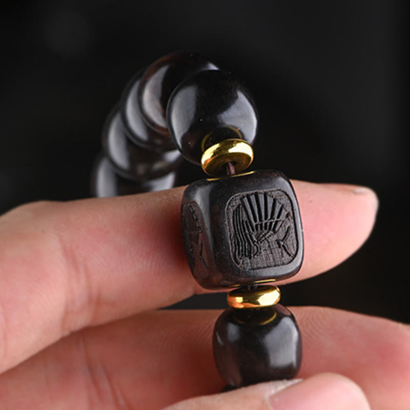 Bracelet d'équilibre porte-bonheur et trésor en perles de bois d'ébène tibétain avec Buddha Stones