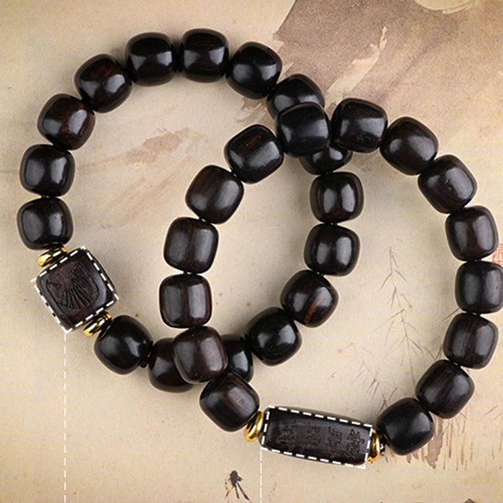 Bracelet d'équilibre porte-bonheur et trésor en perles de bois d'ébène tibétain avec Buddha Stones