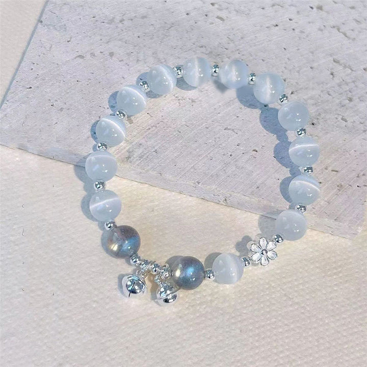 Bracelet de soutien à breloques en forme de Buddha Stones et de personnage Fu en cristal œil de chat et fleur de pêcher
