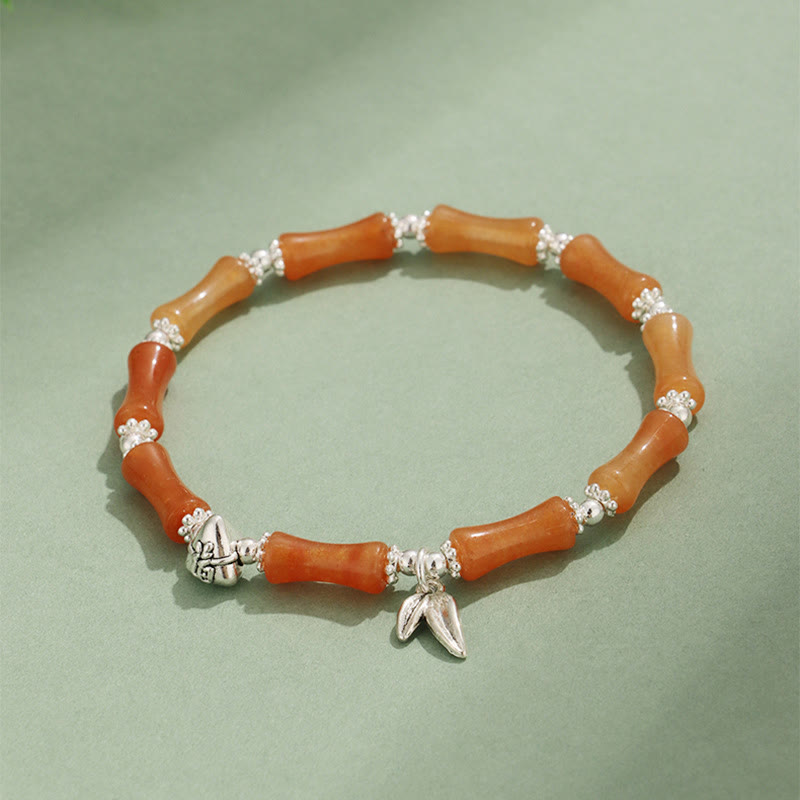 Bracelet porte-bonheur en Buddha Stones, péridot, jade blanc, quartz fraise, aventurine verte, bambou, personnage Fu