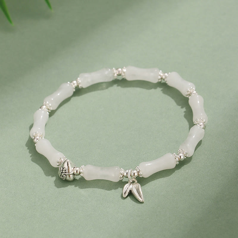 Bracelet porte-bonheur en Buddha Stones, péridot, jade blanc, quartz fraise, aventurine verte, bambou, personnage Fu