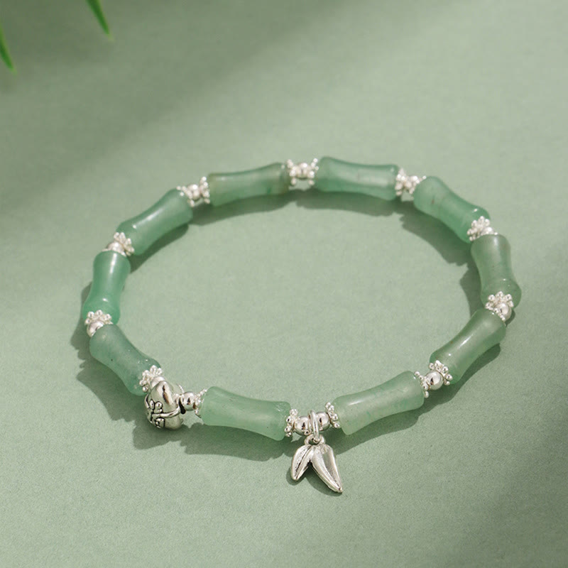 Bracelet porte-bonheur en Buddha Stones, péridot, jade blanc, quartz fraise, aventurine verte, bambou, personnage Fu