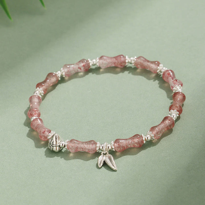 Bracelet porte-bonheur en Buddha Stones, péridot, jade blanc, quartz fraise, aventurine verte, bambou, personnage Fu
