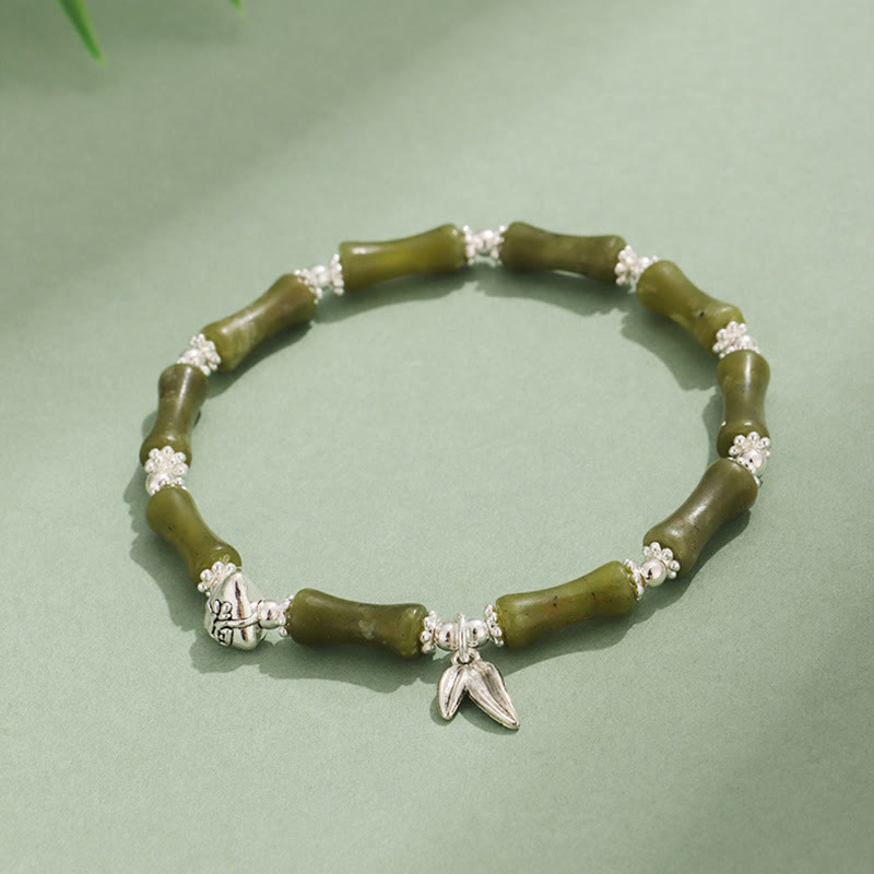Bracelet porte-bonheur en Buddha Stones, péridot, jade blanc, quartz fraise, aventurine verte, bambou, personnage Fu
