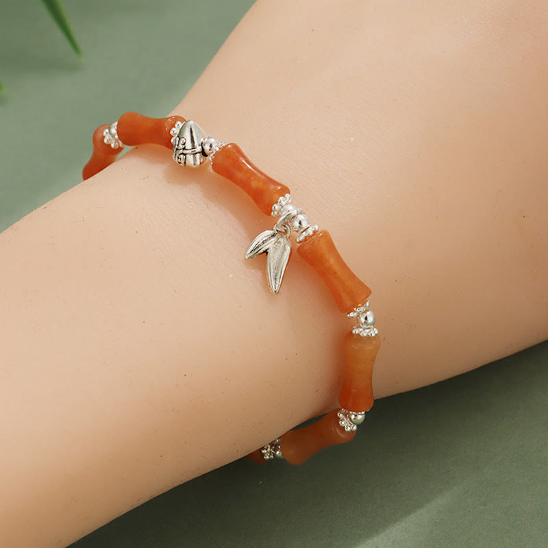 Bracelet porte-bonheur en Buddha Stones, péridot, jade blanc, quartz fraise, aventurine verte, bambou, personnage Fu