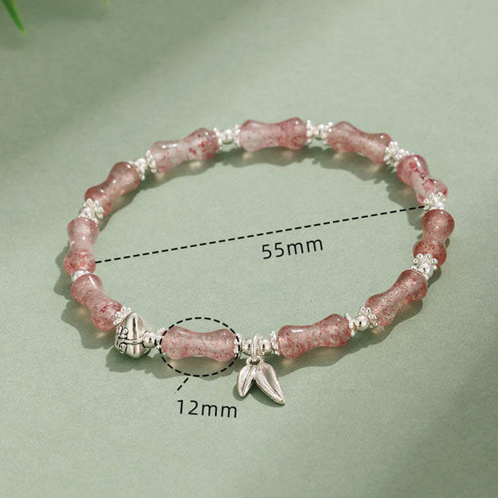 Bracelet porte-bonheur en Buddha Stones, péridot, jade blanc, quartz fraise, aventurine verte, bambou, personnage Fu